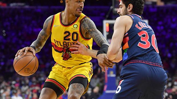 Atlanta Hawks forward John Collins (20) moves to the basket against Philadelphia 76ers guard Furkan Korkmaz (30) during the second quarter at Wells Fargo Center.