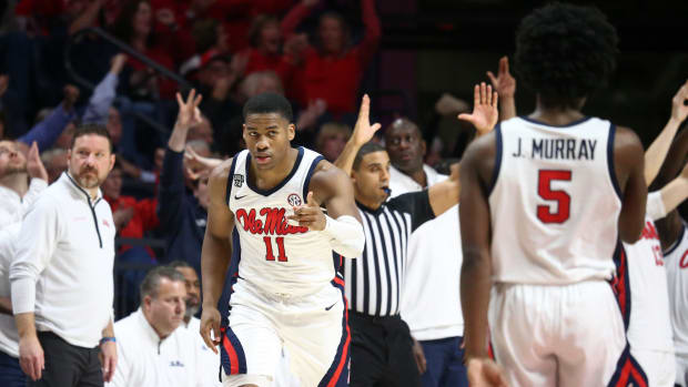 Dec 5, 2023; Oxford, Mississippi, USA; Mississippi Rebels guard Matthew Murrell (11) reacts toward guard Jaylen Murray (5) after a three point basket during the second half at The Sandy and John Black Pavilion at Ole Miss. Mandatory Credit: Petre Thomas-USA TODAY Sports