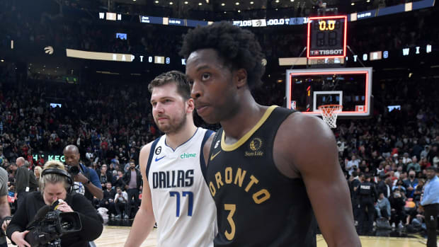 Luka Doncic and O.G. Anunoby meet at center court after a Dallas Mavericks’ game against the Toronto Raptors.