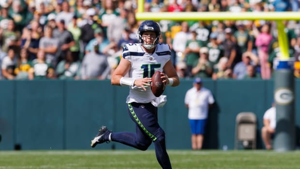 Seattle Seahawks quarterback Holton Ahlers (15) looks to throw a pass during the fourth quarter against the Green Bay Packers at Lambeau Field.