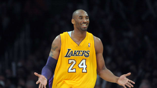Los Angeles Lakers guard Kobe Bryant reacts during a game.