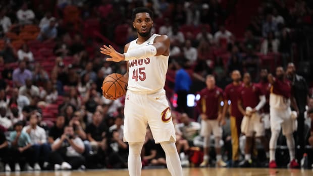 Dec 8, 2023; Miami, Florida, USA; Cleveland Cavaliers guard Donovan Mitchell (45) stands with the ball on the court during the second half against the Miami Heat at Kaseya Center. Mandatory Credit: Jasen Vinlove-USA TODAY Sports