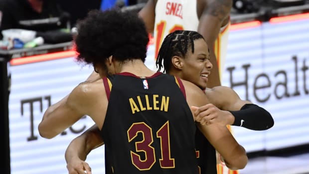 Feb 23, 2021; Cleveland, Ohio, USA; Cleveland Cavaliers center Jarrett Allen (31) and guard Isaac Okoro (35) celebrate after the Cavs beat the Atlanta Hawks at Rocket Mortgage FieldHouse.