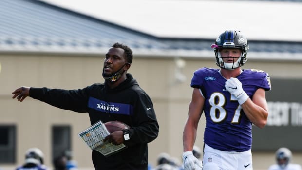 Bobby Engram directing players in practice with the Ravens.