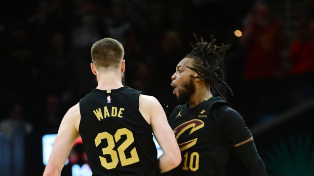 Mar 5, 2024; Cleveland, Ohio, USA; Cleveland Cavaliers forward Dean Wade (32) and Cleveland Cavaliers guard Darius Garland (10) celebrate during the second half against the Boston Celtics at Rocket Mortgage FieldHouse. Mandatory Credit: Ken Blaze-USA TODAY Sports