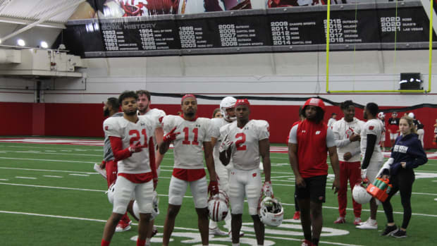The Wisconsin cornerbacks posing for a picture during a break time.