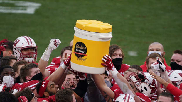 The Wisconsin Badgers celebrate a Duke's Mayo Bowl win.
