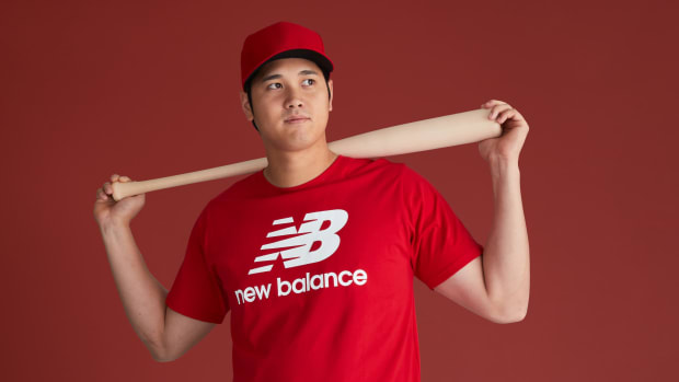 Shohei Ohtani poses with a baseball bat.