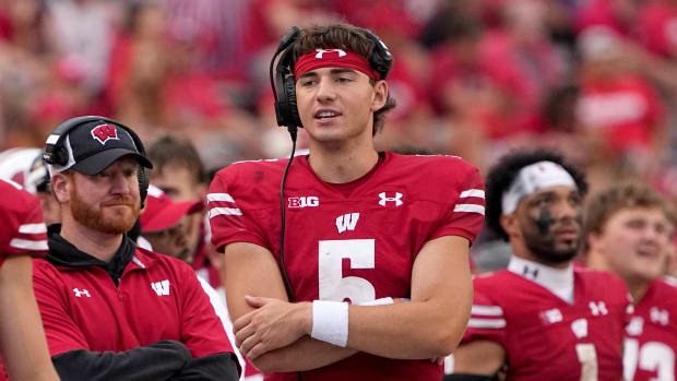 Wisconsin quarterback Graham Mertz standing on the sidelines during the fourth quarter against New Mexico State.
