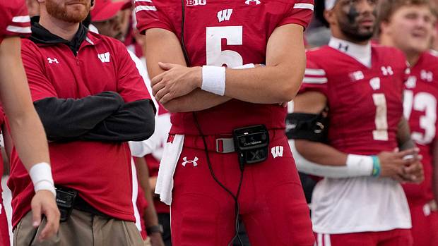 Wisconsin quarterback Graham Mertz standing on the sidelines during the fourth quarter against New Mexico State.
