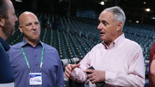 Oct 7, 2021; Houston, Texas, USA; MLB commissioner Rob Manfred (right) and chief revenue officer Noah Garden (left) in attendance before game one of the 2021 ALDS between the Houston Astros and the Chicago White Sox at Minute Maid Park. Mandatory Credit: Troy Taormina-USA TODAY Sports