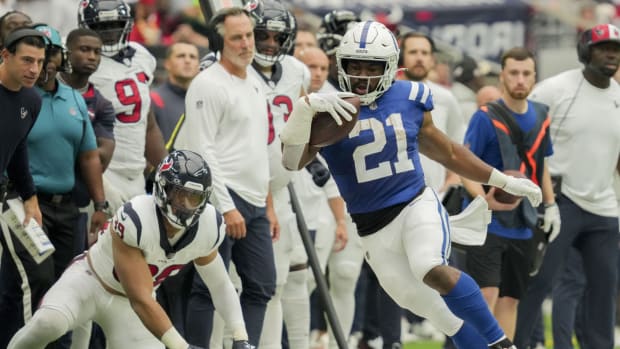 Sep 17, 2023; Houston, Texas, USA; Indianapolis Colts running back Zack Moss (21) runs along the edge of the sideline against the Houston Texans at NRG Stadium.