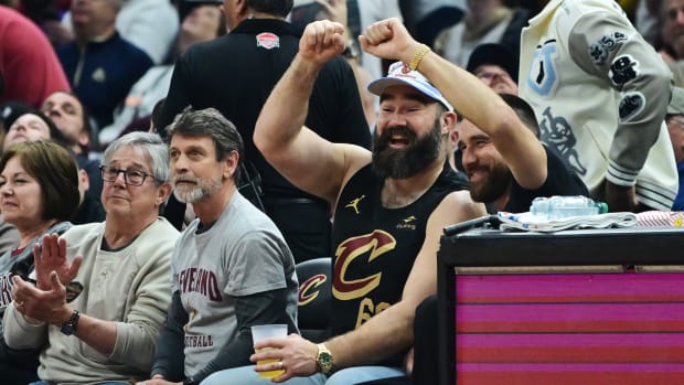 Mar 5, 2024; Cleveland, Ohio, USA; Jason, middle, and Travis Kelce, right, watch the game between the Cleveland Cavaliers and the Boston Celtics during the first half at Rocket Mortgage FieldHouse. Mandatory Credit: Ken Blaze-USA TODAY Sports