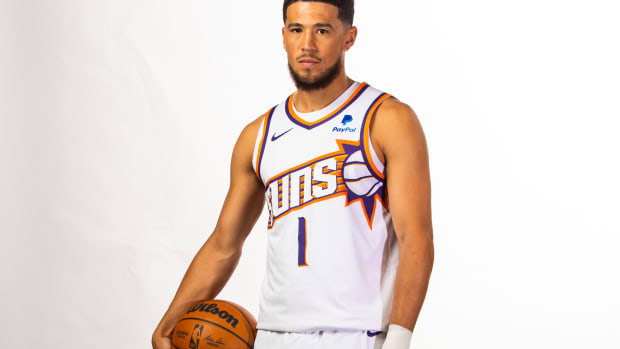 Phoenix Suns guard Devin Booker poses for a portrait during media day.