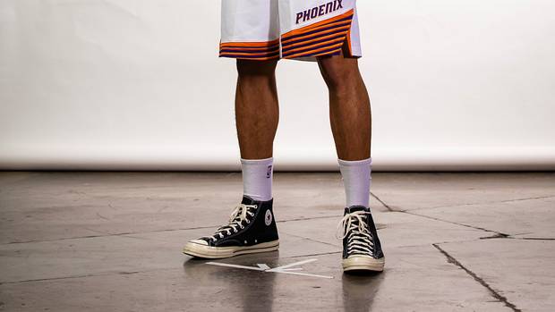 Phoenix Suns guard Devin Booker poses for a portrait during media day.