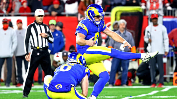 Jan 23, 2022; Tampa, Florida, USA; Los Angeles Rams kicker Matt Gay (8) kicks the game winning field goal during the second half against the Tampa Bay Buccaneers in a NFC Divisional playoff football game at Raymond James Stadium. Mandatory Credit: Kim Klement-USA TODAY Sports
