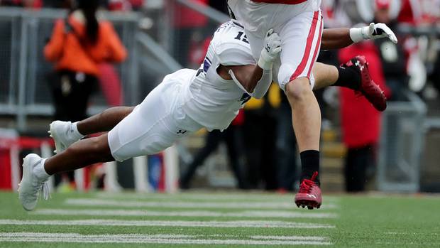 Wisconsin safety John Torchio returning an interception against Northwestern.