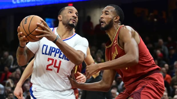 Jan 29, 2024; Cleveland, Ohio, USA; Los Angeles Clippers guard Norman Powell (24) drives to the basket against Cleveland Cavaliers forward Evan Mobley (4) during the second half at Rocket Mortgage FieldHouse. Mandatory Credit: Ken Blaze-USA TODAY Sports