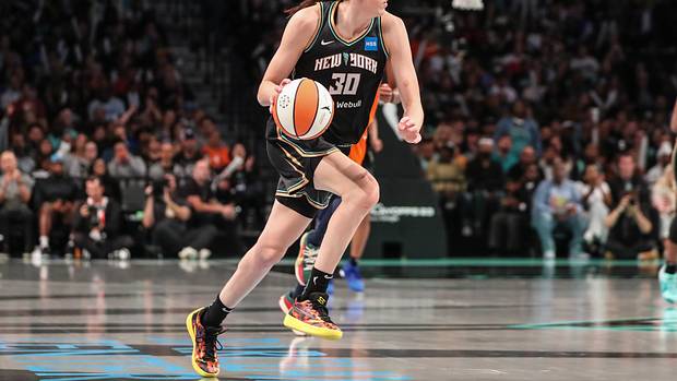 New York Liberty forward Breanna Stewart dribbles the basketball.