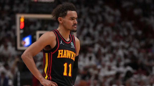 Atlanta Hawks guard Trae Young scowls during a game in Miami.