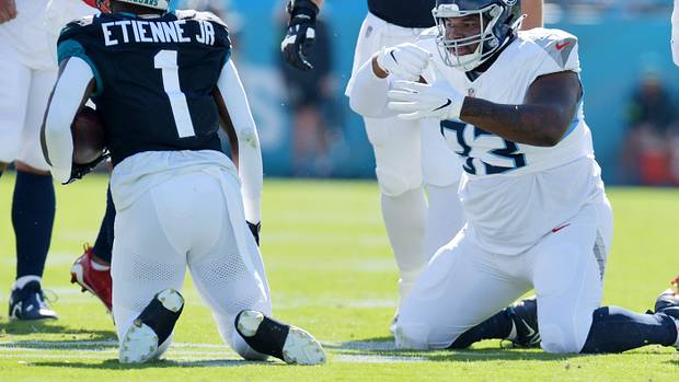 Tennessee Titans Teair Tart (93) makes an eating motion after a late first quarter tackle on Jacksonville Jaguars running back Travis Etienne Jr. (1). The Jacksonville Jaguars hosted the Tennessee Titans
