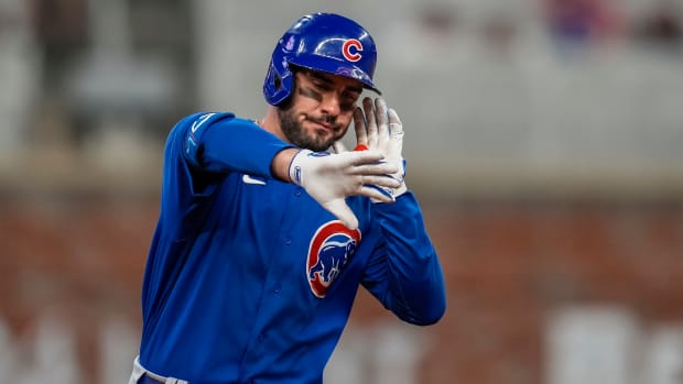 Sep 27, 2023; Cumberland, Georgia, USA; Chicago Cubs center fielder Mike Tauchman (40) reacts after hitting a home run against the Atlanta Braves during the third inning at Truist Park. Mandatory Credit: Dale Zanine-USA TODAY Sports  