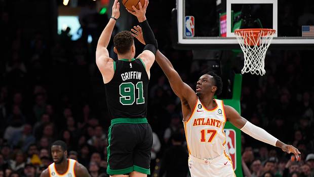 Boston Celtics forward Blake Griffin shoots the ball over Atlanta Hawks forward Onyeka Okongwu.