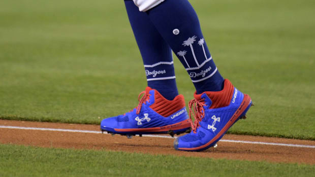 Los Angeles Dodgers pitcher Julio Urias' blue and red Under Armour cleats.