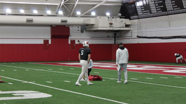 Returning starter Graham Mertz worked closely with graduate assistant Kelly Chryst this spring and new offensive coordinator Bobby Engram.