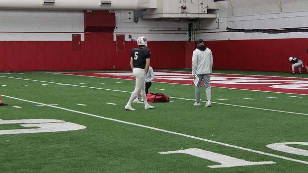 Returning starter Graham Mertz worked closely with graduate assistant Kelly Chryst this spring and new offensive coordinator Bobby Engram.