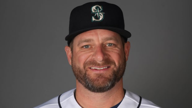 Feb 23, 2023; Peoria, AZ, USA; Seattle Mariners bullpen coach and quality control coach Stephen Vogt (13) poses during Photo Day at Peoria Sports Complex.