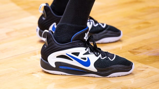 View of black, white, and blue Nike KD shoes.
