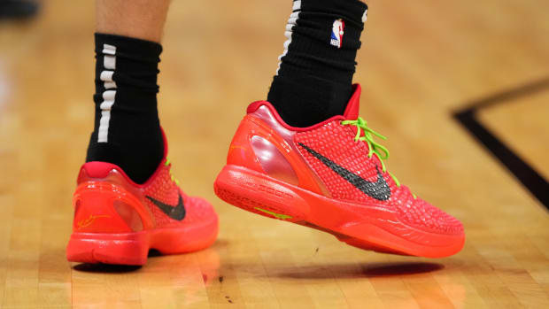 Kobe Bryant's red and black Nike sneakers.