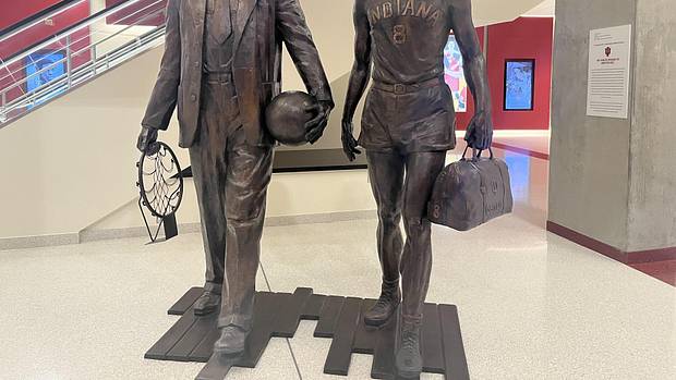 Indiana basketball coach Branch McCracken (left) and Hall of Fame player Bill Garrett (right) are honored with a statue inside the south lobby of Simon Skjodt Assembly Hall.