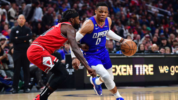 Mar 27, 2023; Los Angeles, California, USA; Los Angeles Clippers guard Russell Westbrook (0) moves to the basket against Chicago Bulls guard Patrick Beverley (21)