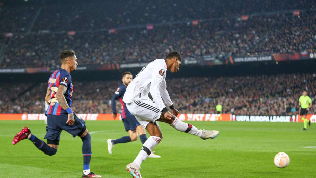Marcus Rashford pictured scoring for Manchester United against Barcelona at the Camp Nou in February 2023