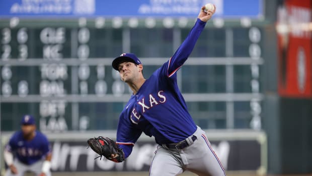 Sep 7, 2022; Houston, Texas, USA; Texas Rangers starting pitcher Cole Ragans (50) delivers a pitch during the second inning against the Houston Astros at Minute Maid Park. Mandatory Credit: Troy Taormina-USA TODAY Sports