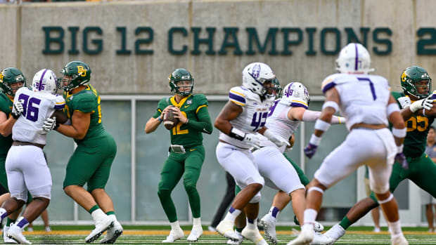 Baylor Bears quarterback Blake Shapen (12) drops back to pass against the Albany Great Danes during the first quarter at McLane Stadium.