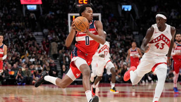 Washington Wizards guard Bilal Coulibaly (0) drives to the net against Toronto Raptors forward Pascal Siakam (43) during the second half at Scotiabank Arena.
