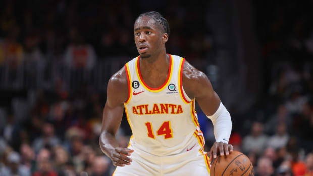 Hawks forward AJ Griffin dribbles the basketball.