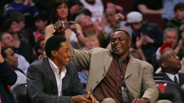Mar 11, 2011; Chicago, IL, USA; Chicago Bulls former players Scottie Pippen (left) and Horace Grant (right) in the second half against the Atlanta Hawks at the United Center.