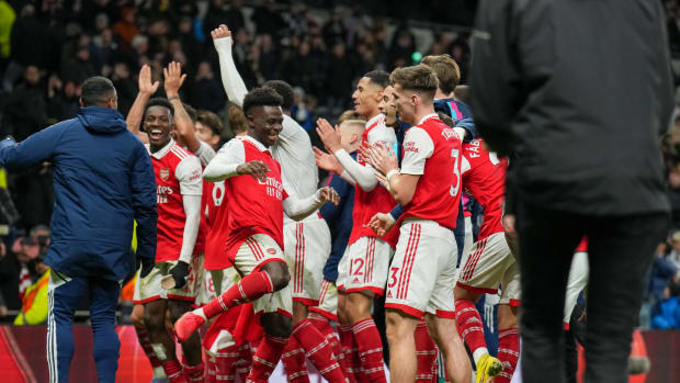 Players from Arsenal pictured celebrating after a 2-0 win at Tottenham sent them eight points clear of Manchester City at the top of the Premier League table in January 2023