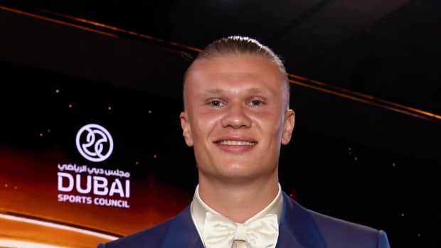 Erling Haaland pictured posing with his trophy after winning the Best Men's Player prize at the 2023 Globe Soccer Awards in Dubai