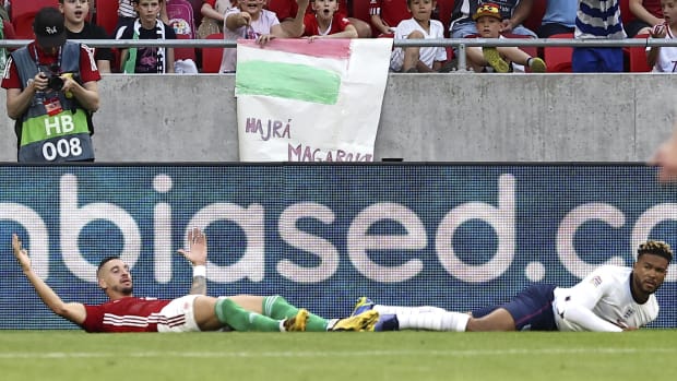 Zsolt Nagy (left) and Reece James pictured on the floor after the England defender was penalized for a foul on the Hungary player