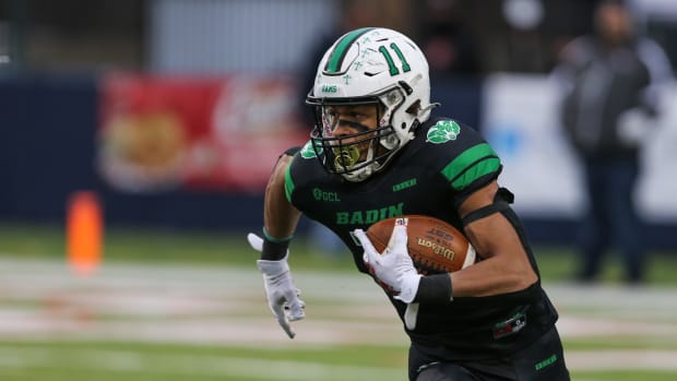 Braedyn Moore of Stephen T Badin High School in Ohio running with the football in the state championship game.