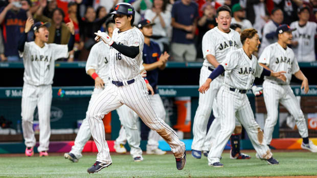 Shohei Ohtani scores a run during the World Baseball Classic.