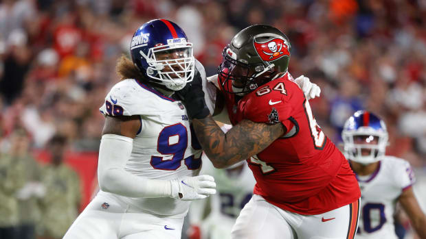 New York Giants defensive end Leonard Williams (99) rushes as Tampa Bay Buccaneers guard Aaron Stinnie (64) blocks during the second half at Raymond James Stadium. Mandatory Credit: Kim Klement-USA TODAY Sports