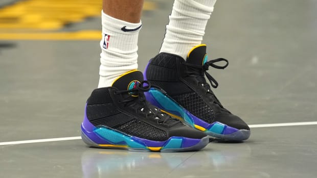 New Orleans Pelicans forward Brandon Ingram's black and blue Air Jordan sneakers.