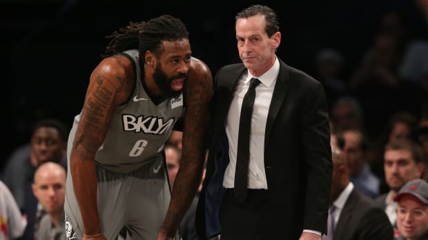 Brooklyn Nets center DeAndre Jordan (6) talks to head coach Kenny Atkinson during the fourth quarter against the Charlotte Hornets at Barclays Center.
