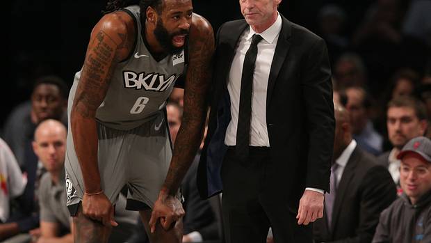 Brooklyn Nets center DeAndre Jordan (6) talks to head coach Kenny Atkinson during the fourth quarter against the Charlotte Hornets at Barclays Center.